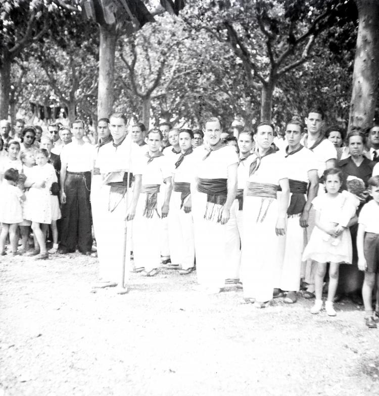Fira de setembre. Desfilada i actes politicomilitars, a l'actual Parc de l'Hort de l'Abat-Jardins del Paga-li Joan.