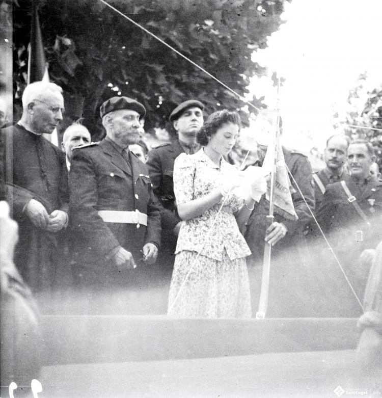 Fira de setembre. Desfilada i actes politicomilitars, a l'actual Parc de l'Hort de l'Abat-Jardins del Paga-li Joan.