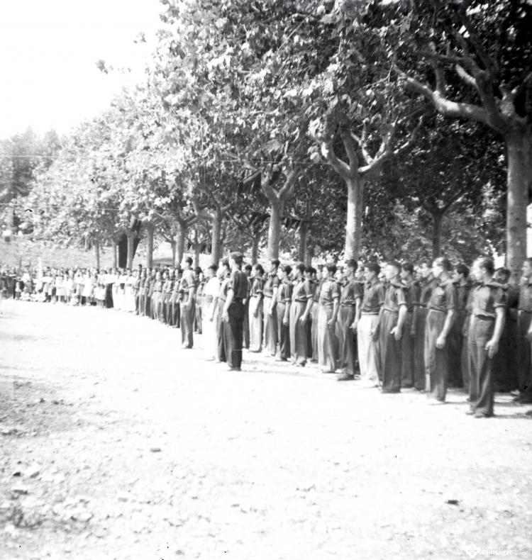 Fira de setembre. Desfilada i actes politicomilitars, a l'actual Parc de l'Hort de l'Abat-Jardins del Paga-li Joan.