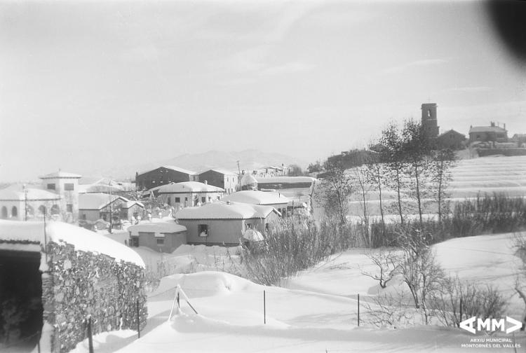 Vista del poble nevat