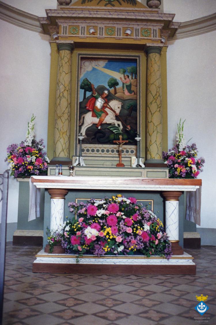 Missa a Sant Jordi de Puigseslloses per commemorar el 125è aniversari de la missa nova de Verdaguer, concelebrada per l'Excm. i Rvdm. Josep M. Guix, bisbe de Vic, i l'Excm. i Rvdm. Jaume Camprodon, bisbe de Girona. Cant coral Orfeó Vigatà