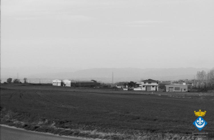 Perspectives de Folgueroles. Entrada al municipi des de la carretera de Vilanova de Sau