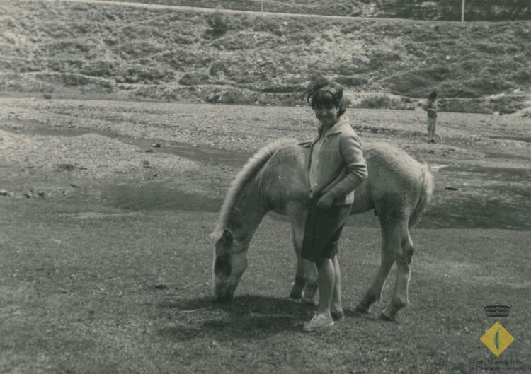 Dona amb un cavall