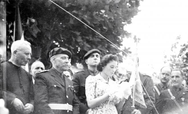 Fira de setembre. Desfilada i actes politicomilitars, a l'actual Parc de l'Hort de l'Abat-Jardins del Paga-li Joan.