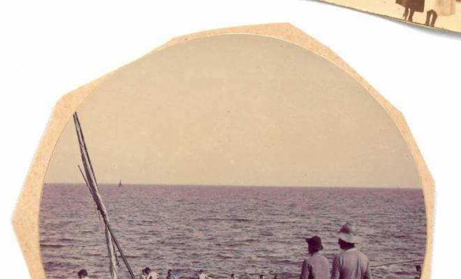 Platja amb barques i nens a Barcelona