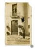 Estralls causats durant la revolta del mes d'agost de 1917 a la façana del bar El Diluvio, (regentat per Magí Marcé) a la carretera de Barcelona, cantonada amb carretera de Molins de Rei