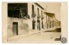Façana de la Federación Obrera de Sabadell amb impactes de bala en motiu de la Vaga general. Carrer de l'Estrella. Sabadell. Edició postal.