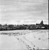Vista del nucli de Sant Cugat nevat.