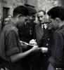 Desfilada i actes politico militars. La Centuria Luis Paraíso del Frente de Juventudes al recinte del Monestir.