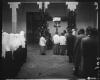 Mossèn Griera oficia un acte de benedicció d'una campana al pati del Col·legi Santa Isabel de les monges Franciscanes Missioneres de la Immaculada Concepció.