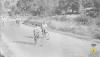Grup de joves en bicicleta per l'actual carretera BV-2421 el dia de la visita del bisbe de Barcelona